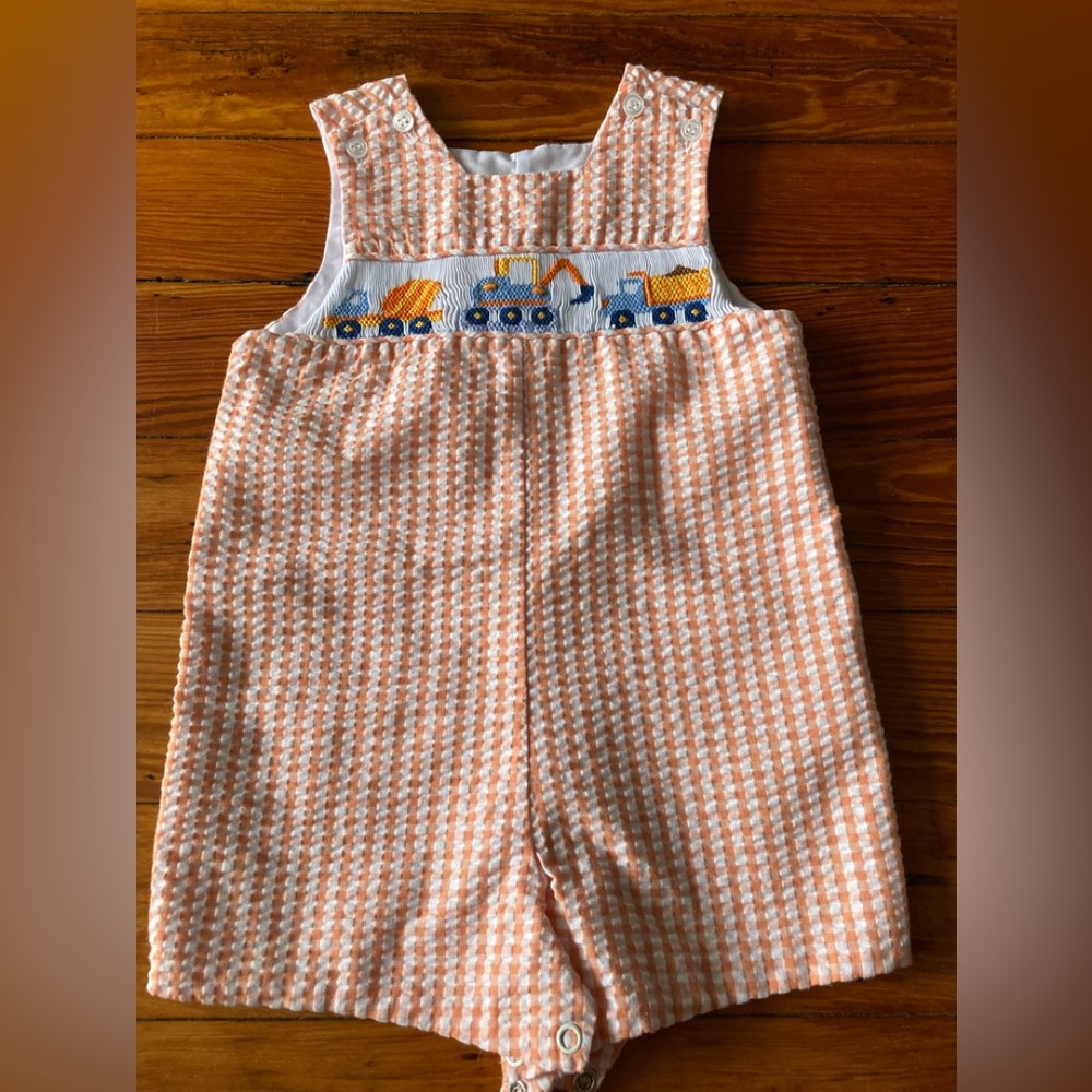 Orange and white checkered smocked construction trucks jumper